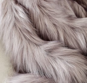 Pouf en fausse fourrure